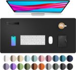 Aothia black faux leather desk pad, rectangular, shown with a laptop, mouse, and keyboard on a desk.