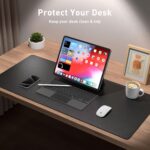 Aothia black faux leather desk pad, rectangular, shown with a laptop, mouse, and keyboard on a desk.