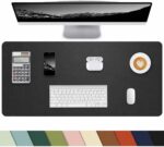 Large dark green faux leather desk mat by CEBOWA, rectangular, protecting a desk surface with a laptop and mouse on it.