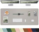 Large dark green faux leather desk mat by CEBOWA, rectangular, protecting a desk surface with a laptop and mouse on it.