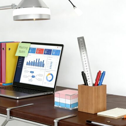Clear acrylic square holder for 3x3 inch sticky notes, empty and showing its transparent design on a clean desk.