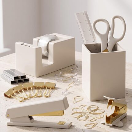 A complete 10-piece KIBAGA desk organizer set in beige and gold, including a stapler, scissors, pen holder, and tape dispense