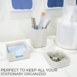 A set of three gray concrete desk organizers, including a tall pen holder, a square notes holder, and a small metal clip hold