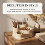 Beige OAKOA aesthetic desk organizer with four compartments, holding pens and small office supplies on a clean desk.